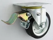 Kółka i bloczki - Zabi Koło metalowo-gumowe w obudowie skrętnej z hamulcem fi 140 - miniaturka - grafika 1